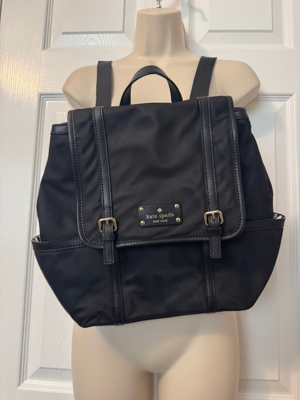 Kate Spade black nylon flap backpack with buckle straps! Super great size!